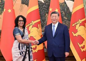 习近平会见斯里兰卡总理阿马拉苏里亚